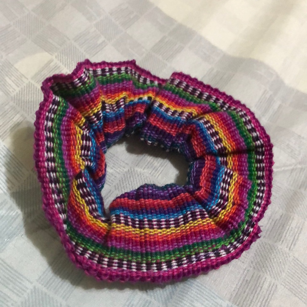 Handmade scrunchie made from hand woven fabric.